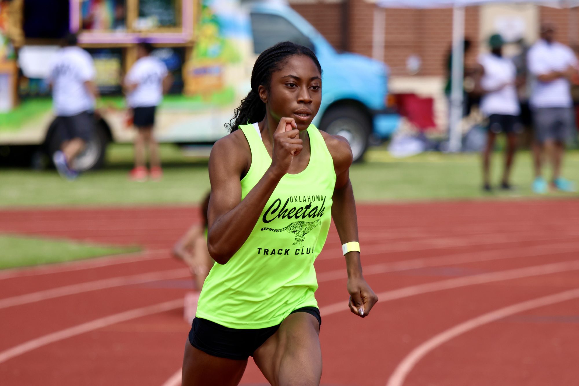 Oklahoma Cheetah athlete sprinting on the track