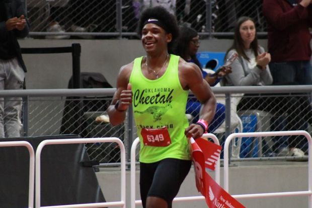 Oklahoma Cheetah athlete crossing the finish line at New Balance Nationals