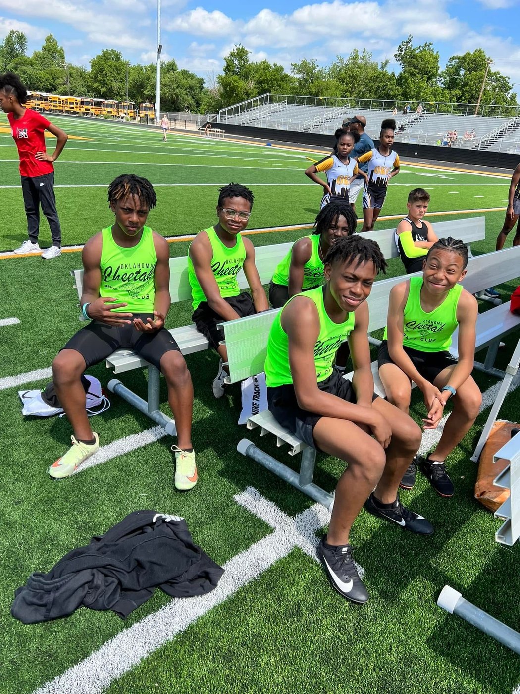 Cheetah athletes between events at a track meet